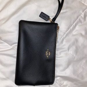 Double zipper black wallet from Coach. Never used.